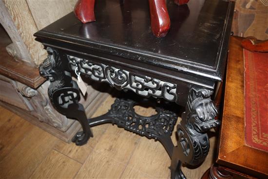 A Chinese carved ebonised occasional table W.58cm